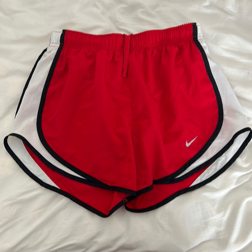 Red Nike shorts